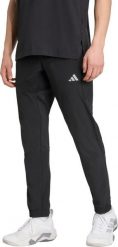 Adidas Spodnie męskie adidas Tech Apparel czarne JM8135 3XL. Czarne spodnie sportowe męskie Adidas, m, bez wzorów. Za 236.51 zł.