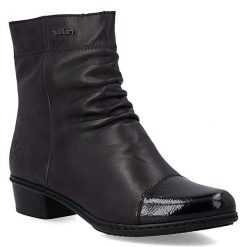Skórzane botki damskie ocieplane na obcasie brązowe Rieker Y0773-25. Brązowe botki damskie Rieker, ze skóry, bez obcasa, na obcasie, bez zapięcia. Za 379.00 zł.