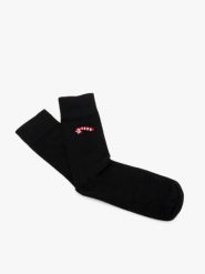 Świąteczne skarpety unisex. Czarne skarpety damskie Ryłko, bez wzorów, z bawełny. Za 24.99 zł.